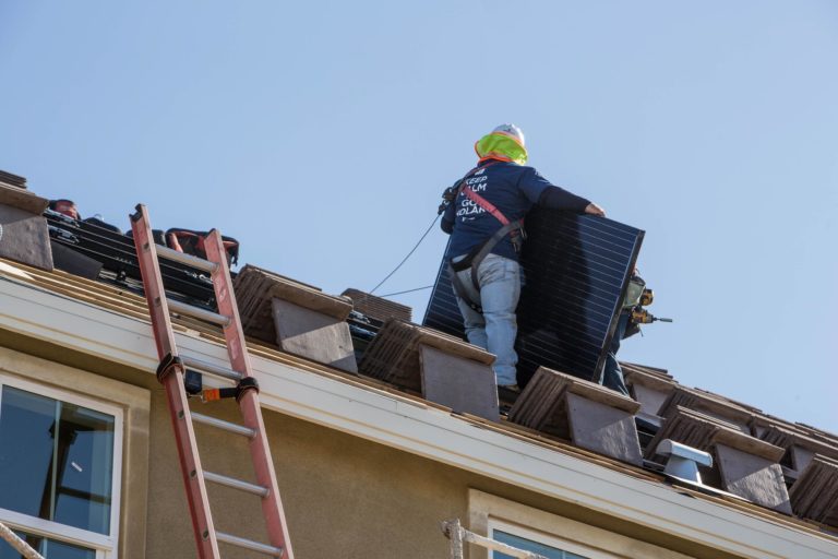 SunStreet workers on the roof