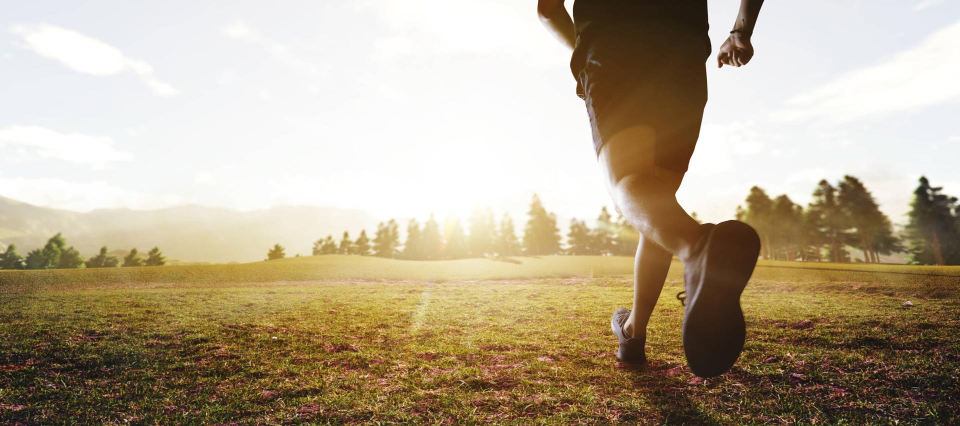 Man running during sunset